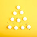 Christmas tree made of white garlsnd balls