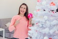 Christmas tree and new year concept photo in white-pink hue. Royalty Free Stock Photo