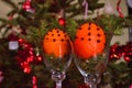 Close-up Christmas Orange Decoration with Christmas tree at background