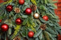 Christmas tree ornaments with beautiful balls on red background