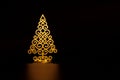 christmas tree painted in gold at black