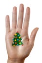 Christmas tree pattern on a hand