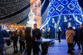 Christmas tree and people at Christmas market with decoration at Cathedral Square in Vilnius, Lithuania