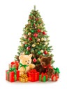 Christmas tree, pile of Christmas gifts, two teddy bears isolated on white background Royalty Free Stock Photo