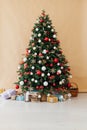 Christmas tree pine decor beige background New Year holiday gifts