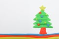 Christmas tree play dough close up image on white background. Royalty Free Stock Photo