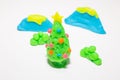 Christmas tree play dough close up image on white background. Royalty Free Stock Photo