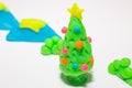 Christmas tree play dough close up image on white background. Royalty Free Stock Photo