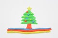 Christmas tree play dough close up image on white background. Royalty Free Stock Photo