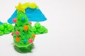 Christmas tree play dough close up image on white background. Royalty Free Stock Photo