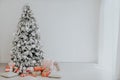 Christmas tree with presents, Garland lights Interior new year winter holiday background Royalty Free Stock Photo