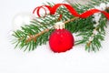 Christmas tree and red ball on snow Royalty Free Stock Photo