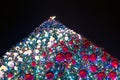 Christmas tree with red, blue and white balls against the dark sky, selective focus Royalty Free Stock Photo