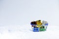 Christmas tree in red gift box with snow on snow backgrounds