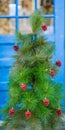 Christmas Tree with Red Pinecone Ornaments Royalty Free Stock Photo