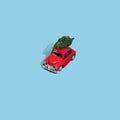 Christmas tree on a red toy car on blue background. Minimal Happy New Year concept Royalty Free Stock Photo