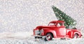 Christmas tree on red toy car trunk Royalty Free Stock Photo