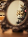 Christmas tree reflection in a old style bronze mirror. Abstract background, Selective focus Royalty Free Stock Photo