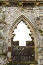 Christmas tree shape in a castle's window Royalty Free Stock Photo
