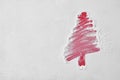 Christmas tree shape in flour on red board. Cristmas sign Royalty Free Stock Photo