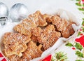 Christmas tree shaped cinnamon biscuits in a paper food basket Royalty Free Stock Photo