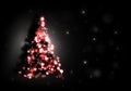 Christmas tree shining on black