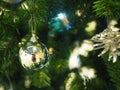 A Christmas tree with silver ornaments is a festive sight. Selective focus. Royalty Free Stock Photo