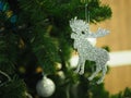 A Christmas tree with silver ornaments is a festive sight. Selective focus. Royalty Free Stock Photo