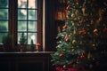 a christmas tree sits in front of a window