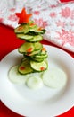 Christmas tree from sliced fresh cucumber Royalty Free Stock Photo