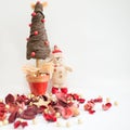 Christmas tree, snowman and red potpourri. white background Royalty Free Stock Photo