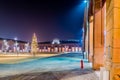 Christmas tree in square surrounded by loggias