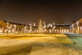 Christmas tree in square surrounded by loggias