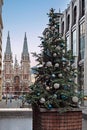 Christmas tree with St. Nicholas Roman Catholic Cathedral in Kyiv, Ukraine