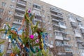 A Christmas tree stands decorated with garlands and tinsel in a Russian city in the courtyard of a residential apartment building Royalty Free Stock Photo