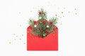 Christmas tree symbol in red envelope on white background. Royalty Free Stock Photo