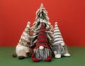 christmas tree and three gnomes gonk on red background