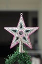 A Christmas tree top tip star topper decoration piece Royalty Free Stock Photo