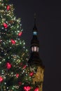 Christmas tree and tower of Town Hall. Tallinn, Estonia. Royalty Free Stock Photo