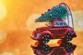 Christmas tree on toy car. Christmas holiday celebration concept Royalty Free Stock Photo