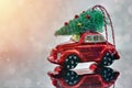 Christmas tree on toy car. Christmas holiday celebration concept Royalty Free Stock Photo