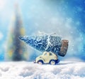 Christmas tree on toy car. Christmas holiday celebration concept Royalty Free Stock Photo