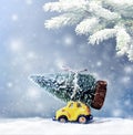 Christmas tree on toy car. Christmas holiday celebration concept Royalty Free Stock Photo