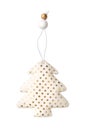 Christmas tree toy made of fabric gold dotted isolated on a white background.