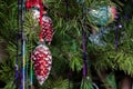 Christmas tree toy - red cones covered with snow Royalty Free Stock Photo