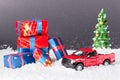 Christmas tree on toy Red Truck car on snow, balls christmas tree branshes. Christmas holiday celebration concept Royalty Free Stock Photo