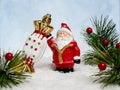 Christmas tree toys santa claus with gifts on a blurry background Royalty Free Stock Photo