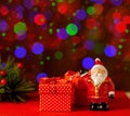 Christmas tree toys santa claus with gifts. New Year's card with a blurry background Royalty Free Stock Photo