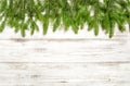 Christmas tree twigs on wooden background. Winter holidays Royalty Free Stock Photo