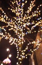 CHRISTMAS TREE UNFOCUSED IN OLD TOWN, WARSAW, POLAND. Royalty Free Stock Photo